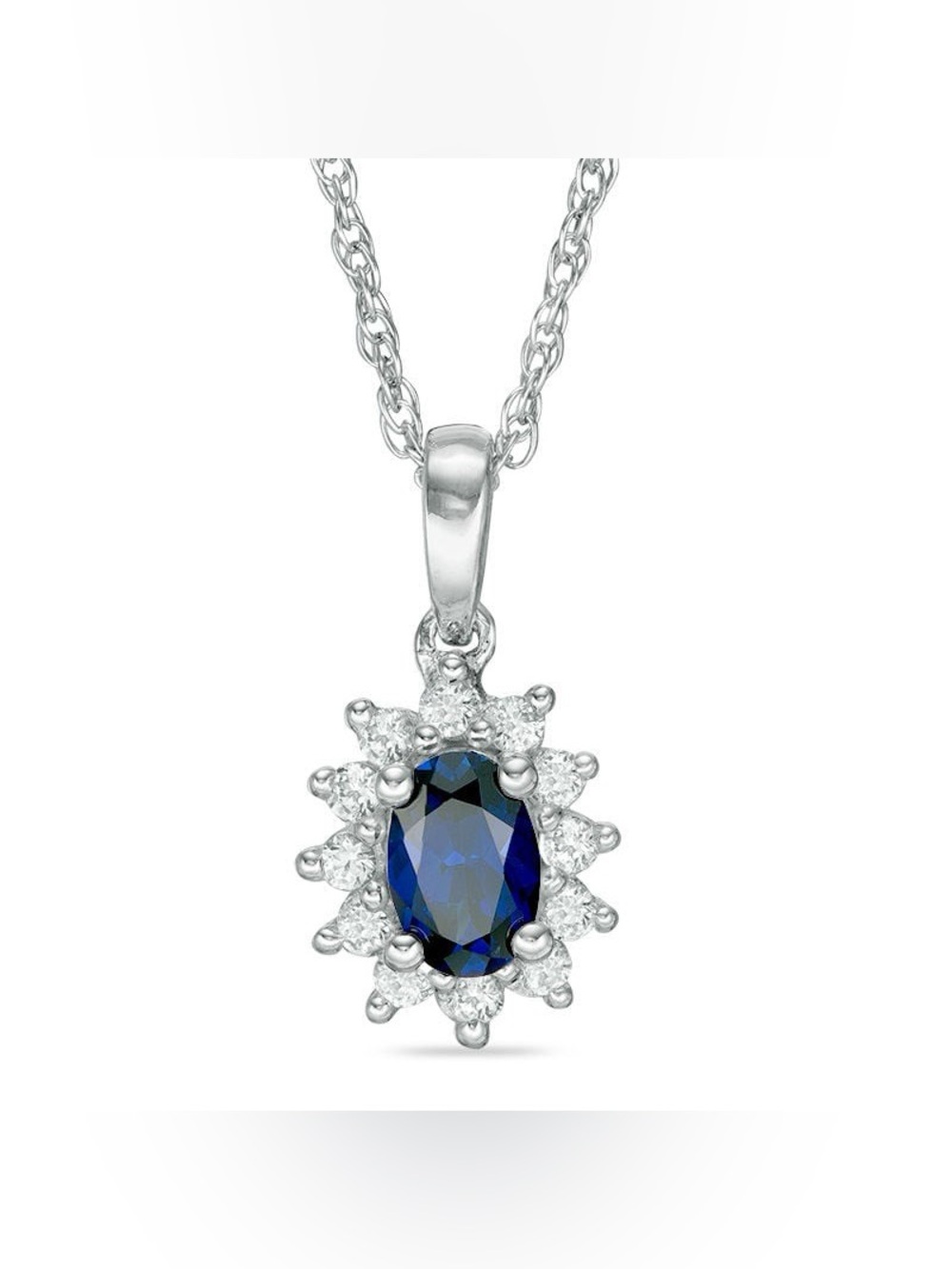 Oval Blue Sapphire 0.18 CT. T.W. Diamond Starburst Pendant in 10K White Gold